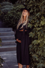 black maternity dress with long sleeves