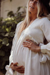 close up of off white maternity dress