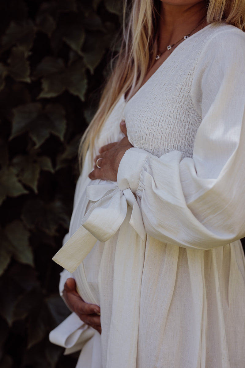 close up of white maternity dress